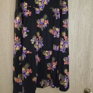 long flowing black maxi skirt with tropical flower